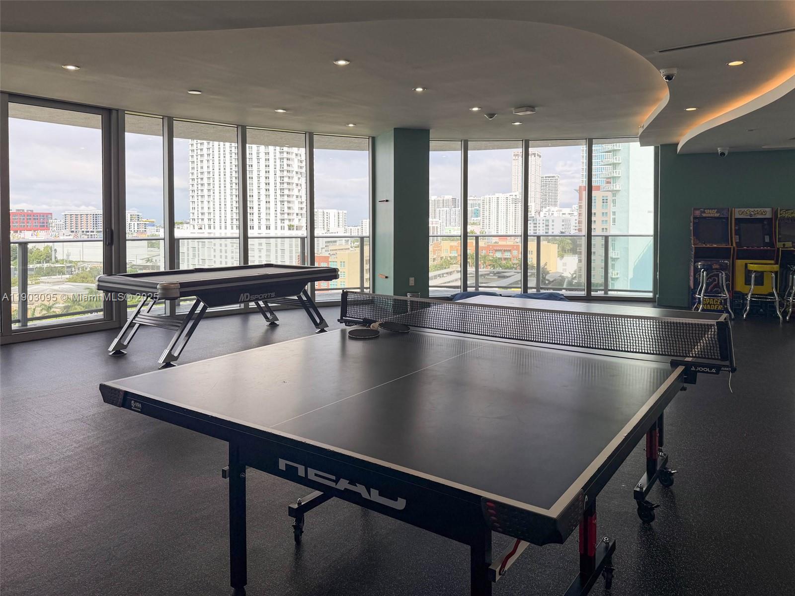 488 Northeast 18th Street, Unit 2301 Miami, FL 33132 - Photo 30 of 43 a view of table tennis in a room