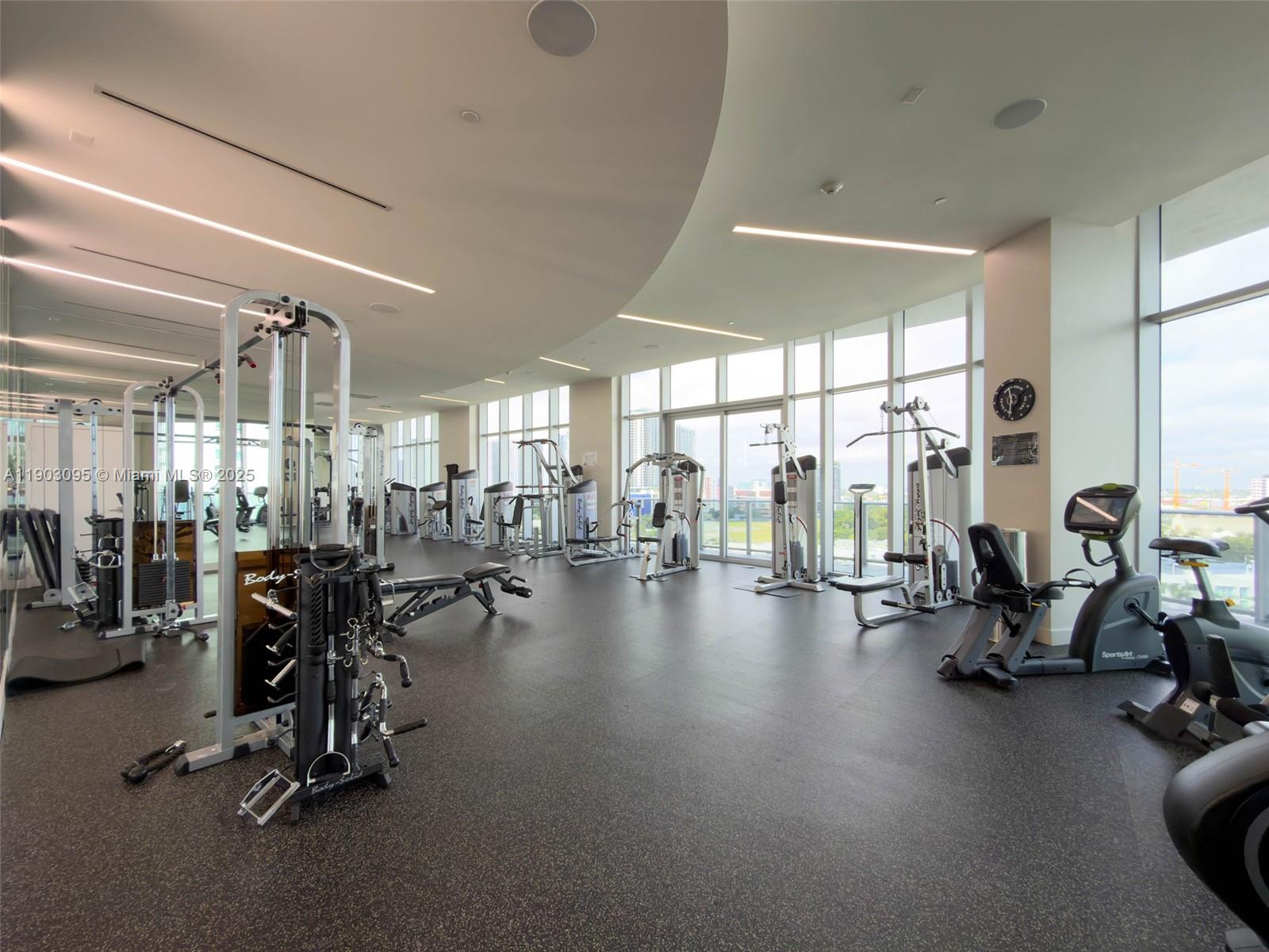 488 Northeast 18th Street, Unit 2301 Miami, FL 33132 - Photo 33 of 43 a view of a room with gym equipment