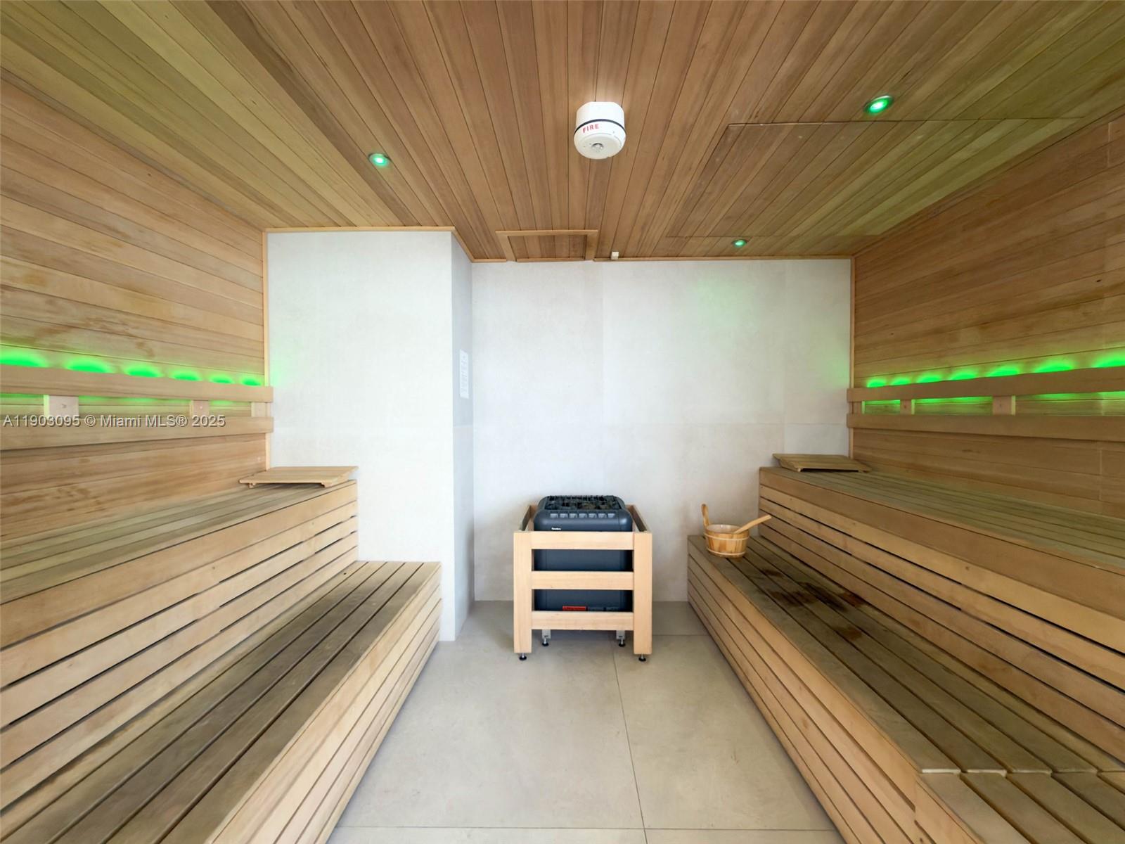 488 Northeast 18th Street, Unit 2301 Miami, FL 33132 - Photo 35 of 43 a empty room with a couch