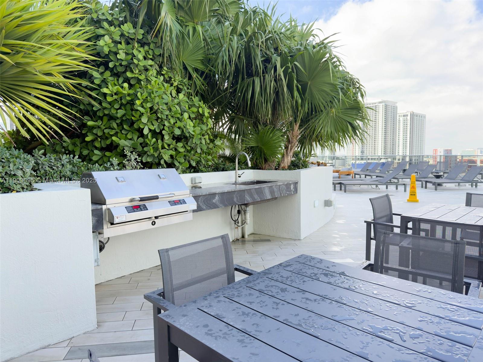 488 Northeast 18th Street, Unit 2301 Miami, FL 33132 - Photo 36 of 43 an outdoor space with furniture