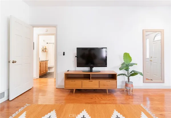 a balcony with a table and chairs