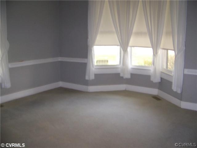 2329 Jonesboro Road Kenbridge, VA 23944 - Photo 7 of 12 an empty room with a window