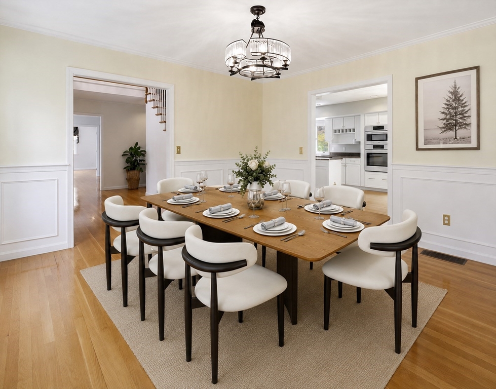 10 Hawk Ridge Road Andover, MA 01810 - Photo 10 of 32 a view of a dining room with furniture and wooden floor