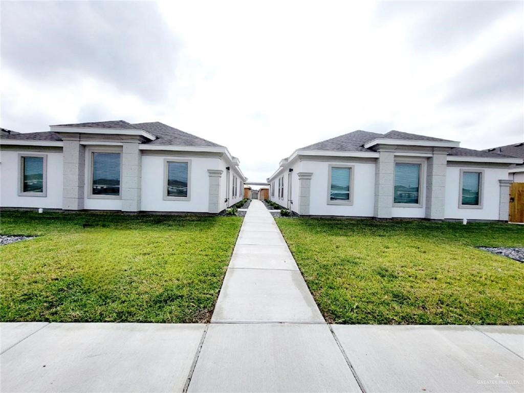 5801 Swallow Avenue, Unit 1 Mission, TX 78573 - Photo 1 of 11 a view of a house with a garden