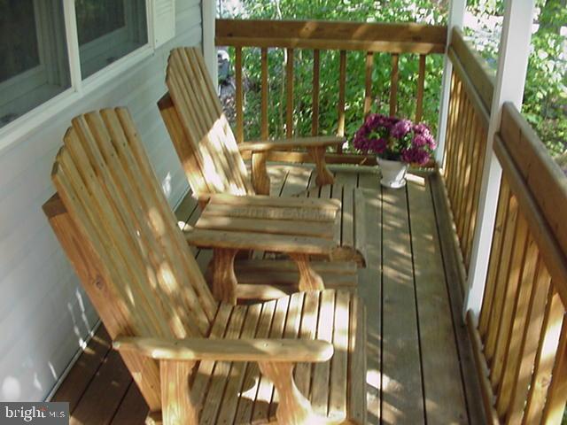 108 Sandyhook Road Ocean Pines, MD 21811 - Photo 3 of 19 a view of two chairs in a balcony