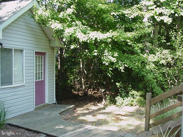 108 Sandyhook Road Ocean Pines, MD 21811 - Photo 4 of 19 a view of a house with a tree