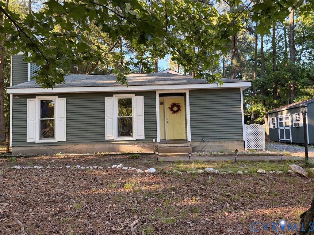 5700 Linda Road Sandston, VA 23150 - Photo 1 of 1 Ranch-style residence featuring green horizontal s