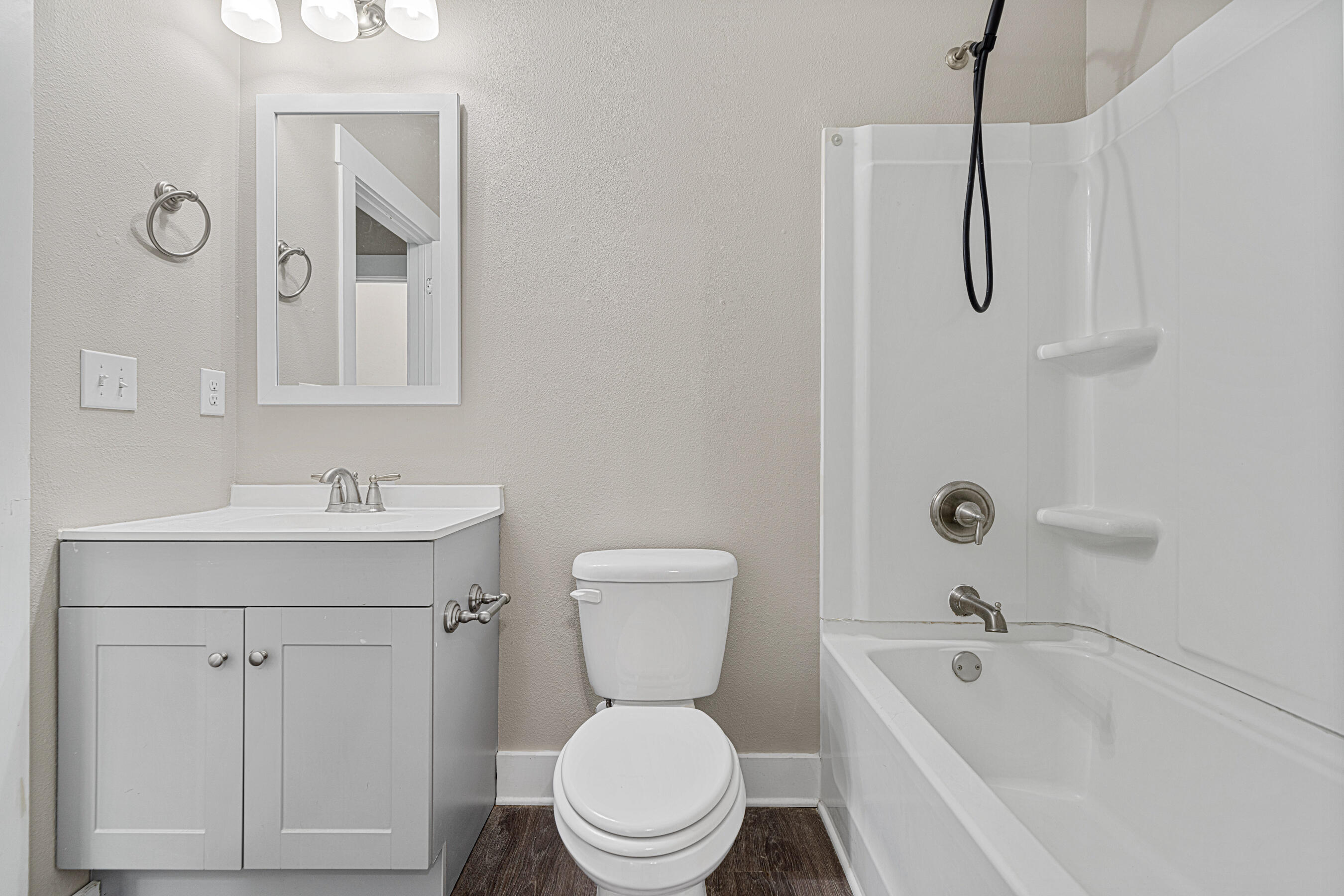 182 North Sand Palm Road Freeport, FL 32439 - Photo 26 of 38 a bathroom with a sink a toilet and a bathtub