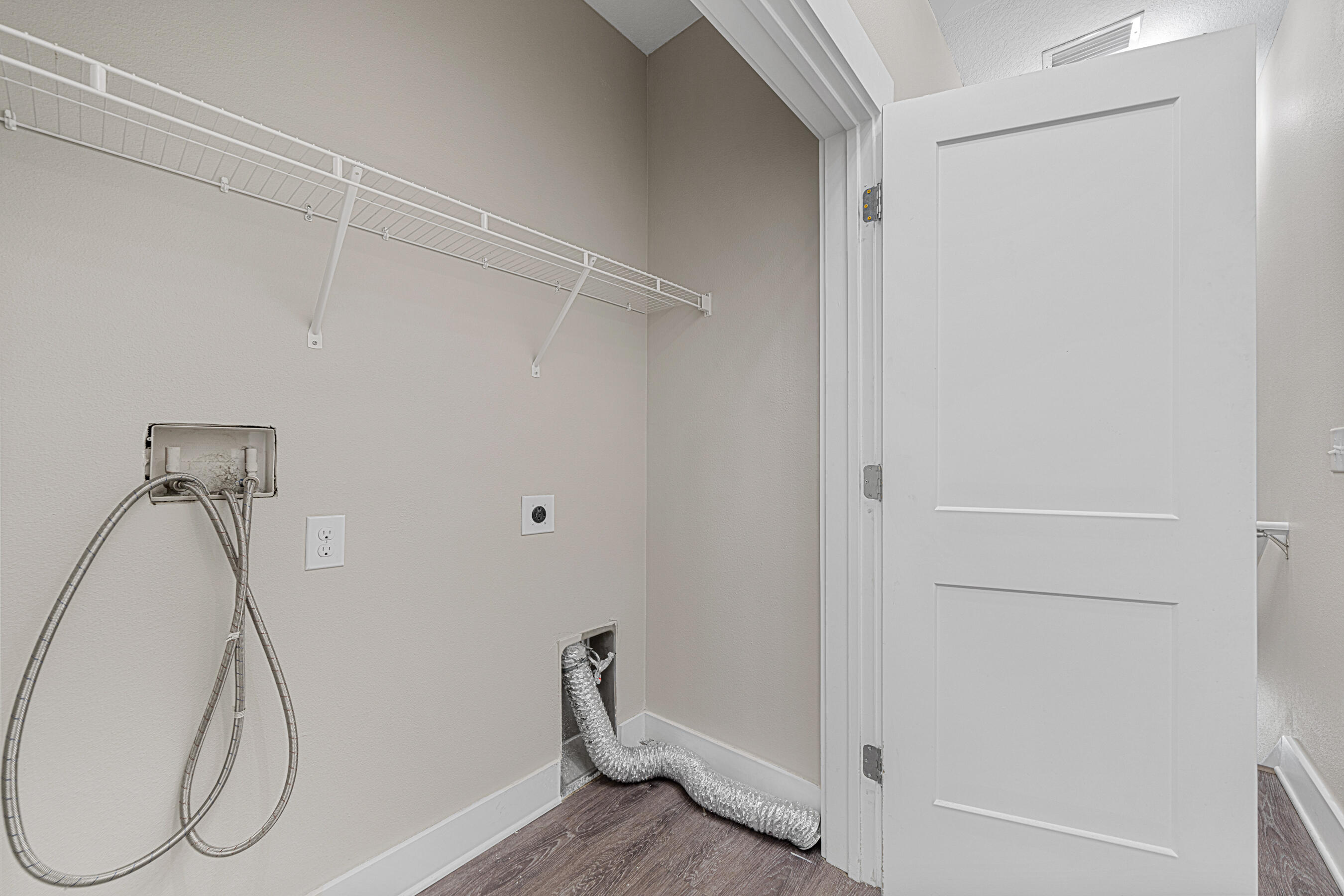 182 North Sand Palm Road Freeport, FL 32439 - Photo 29 of 38 a view of a room with wooden floor