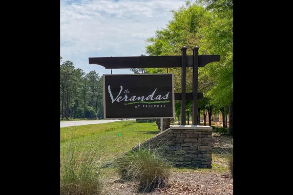 a sign on the side of a road