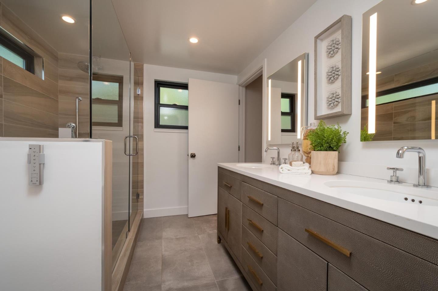933 Janet Lane Lafayette, CA 94549 - Photo 11 of 30 a bathroom with a double vanity sink and mirror