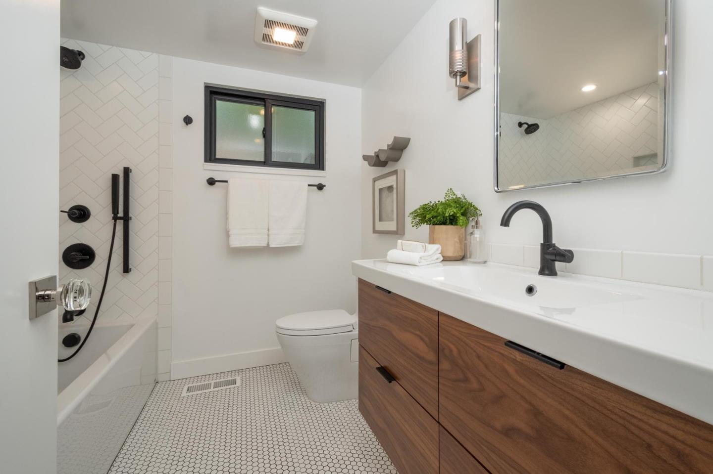 933 Janet Lane Lafayette, CA 94549 - Photo 17 of 30 a bathroom with a sink a toilet and shower