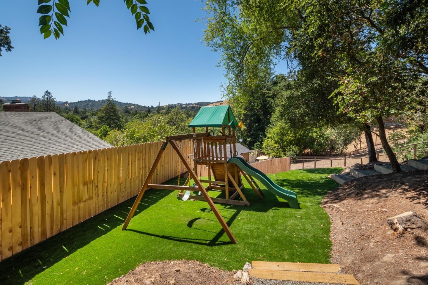 933 Janet Lane Lafayette, CA 94549 - Photo 22 of 30 a view of a backyard with a slide