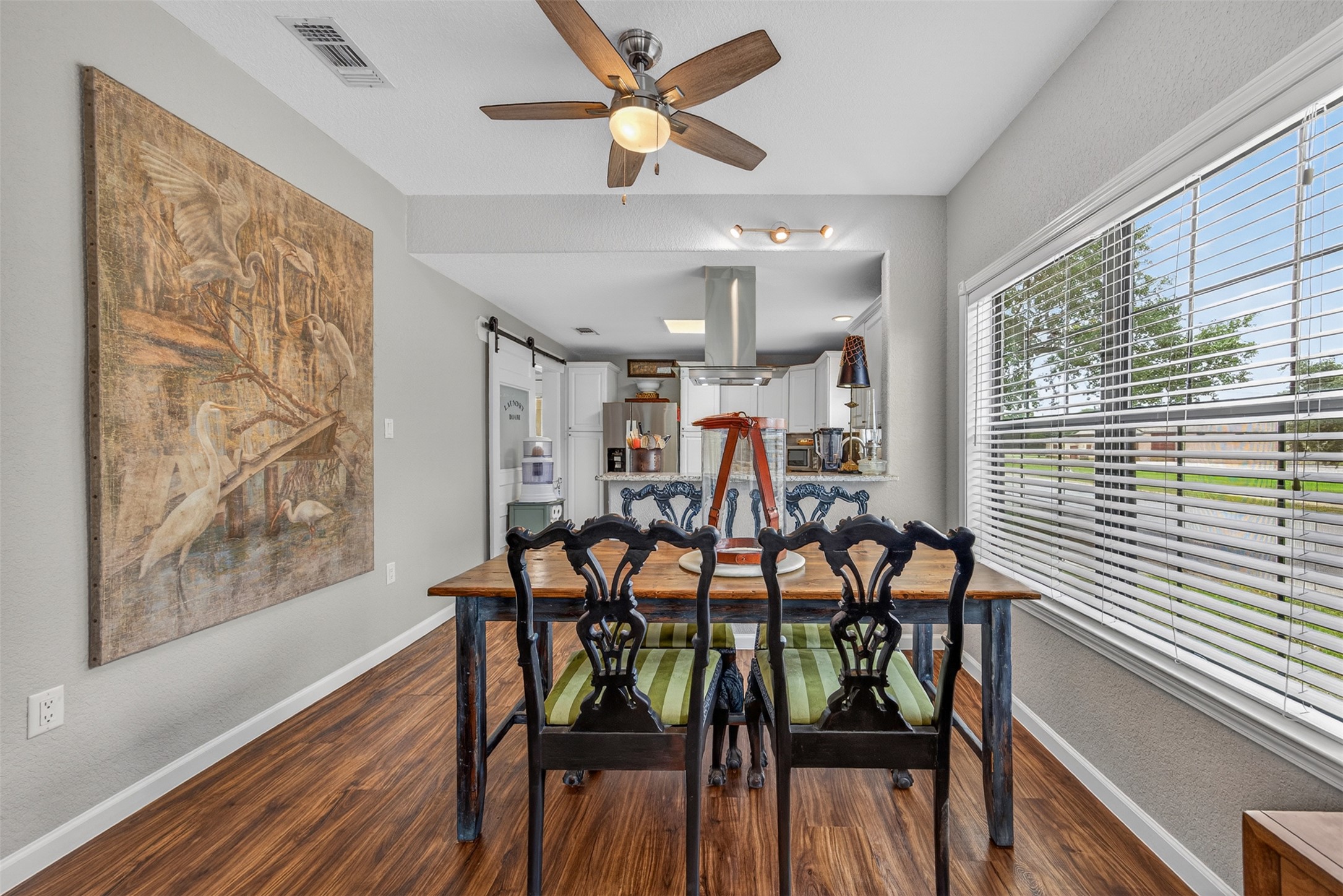 217 Walnut Avenue Luling, TX 78648 - Photo 9 of 38 a view of a dining room with furniture window and wooden floor