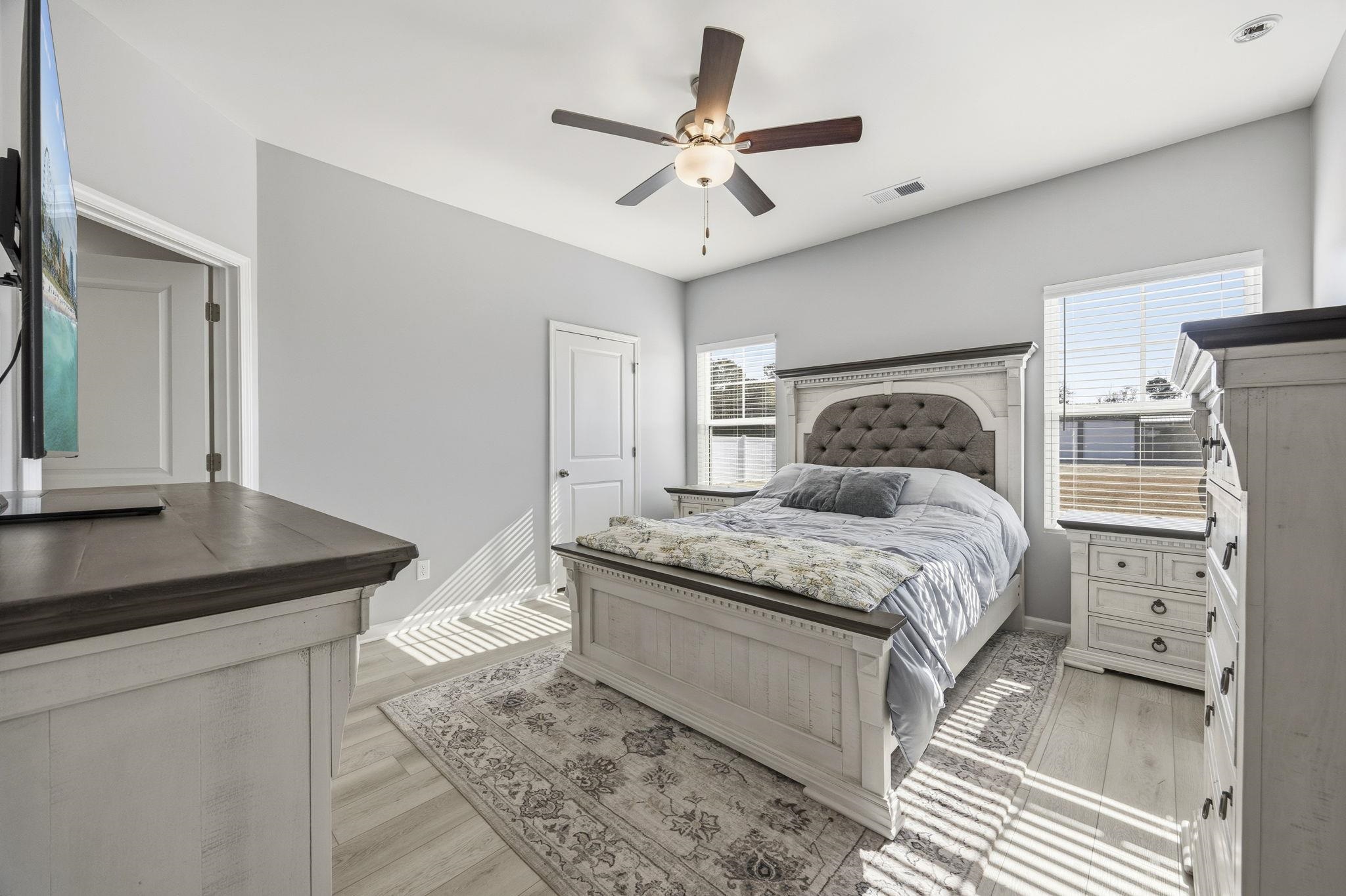 1010 Log Cabin Road Loris, SC 29569 - Photo 14 of 40 Bedroom featuring light wood finished floors and a ceiling fan
