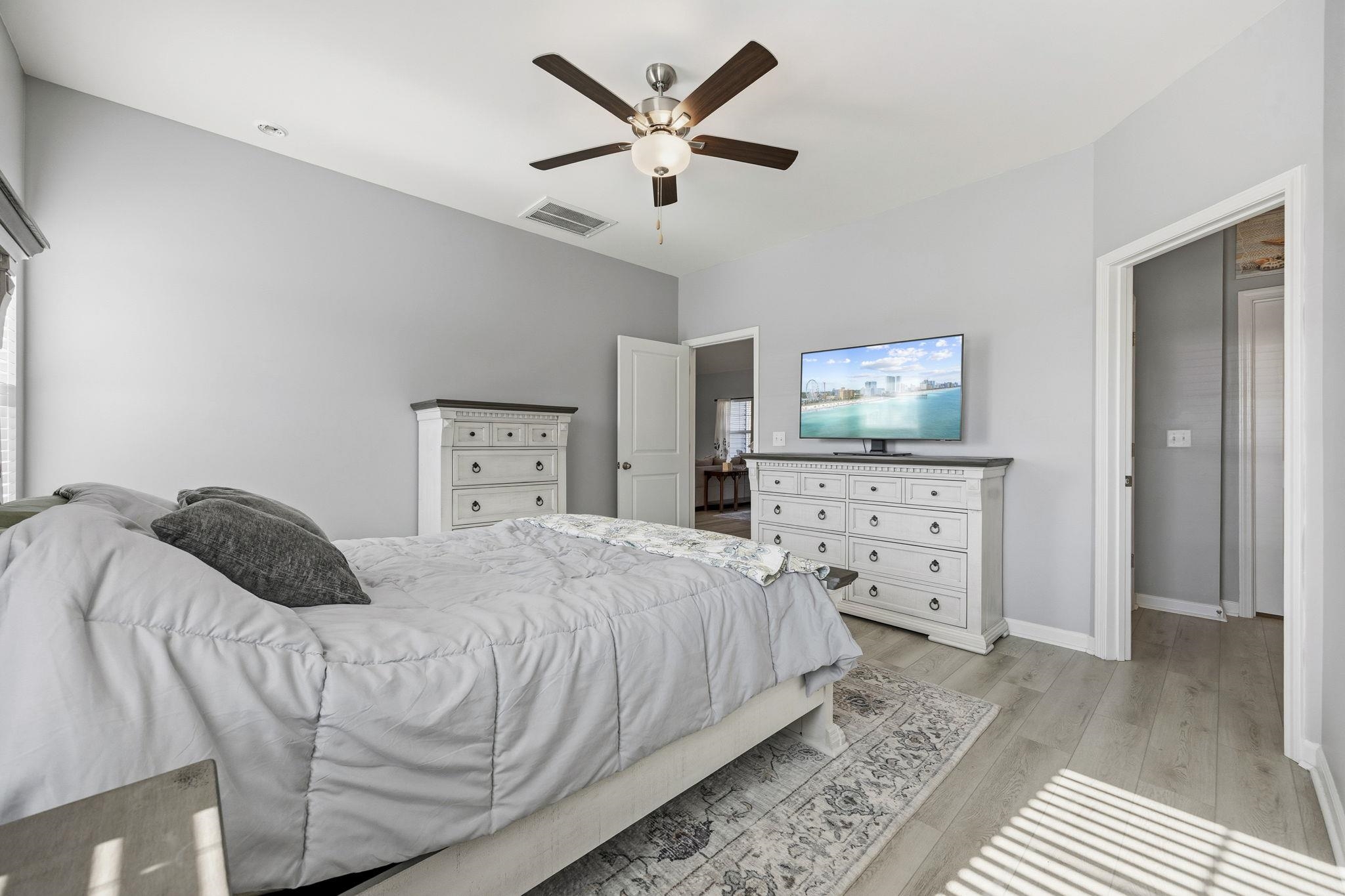1010 Log Cabin Road Loris, SC 29569 - Photo 15 of 40 Bedroom featuring light wood-style flooring and a ceiling fan