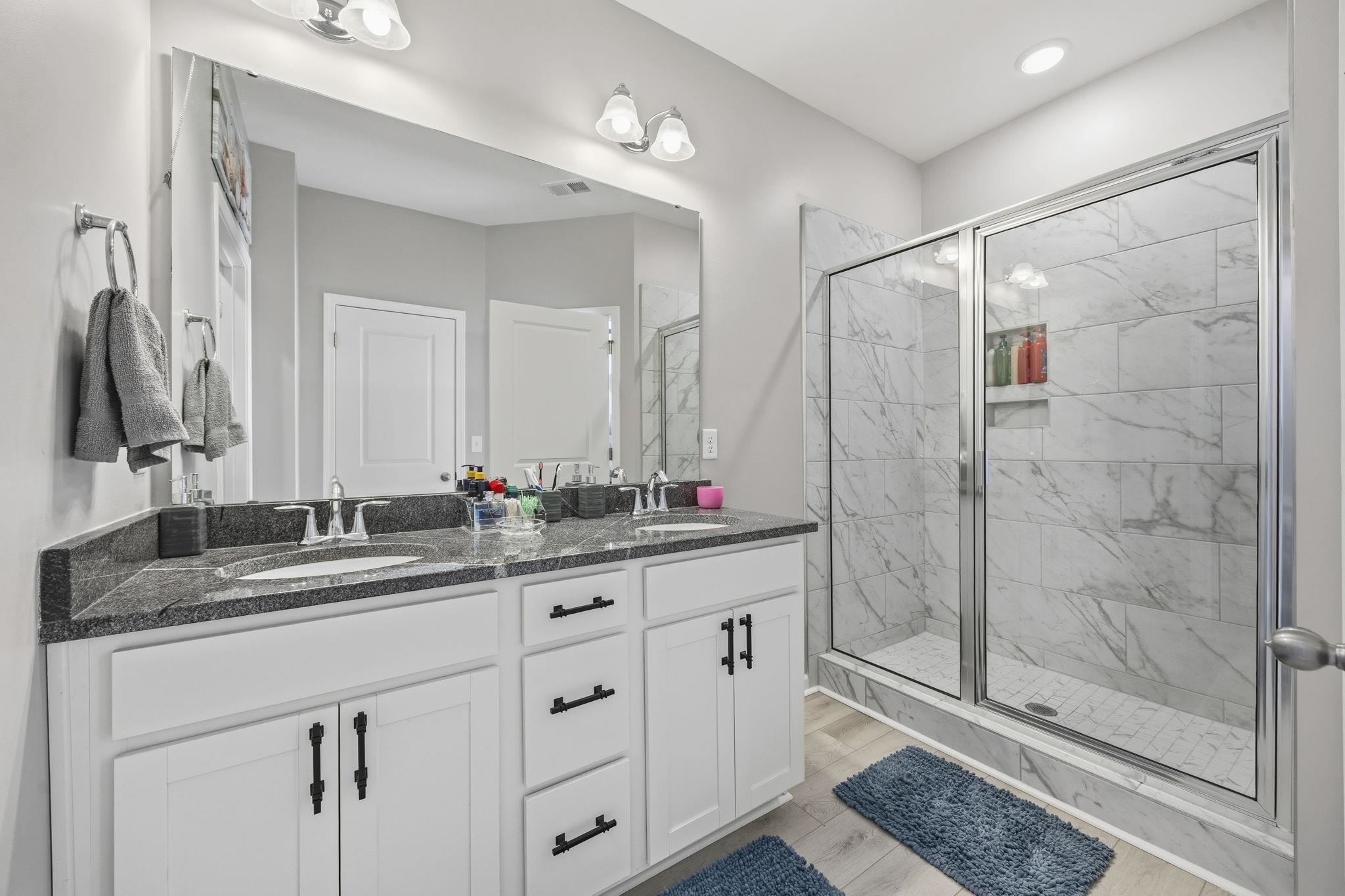 1010 Log Cabin Road Loris, SC 29569 - Photo 16 of 40 Full bath featuring double vanity, a marble finish shower, and recessed lighting