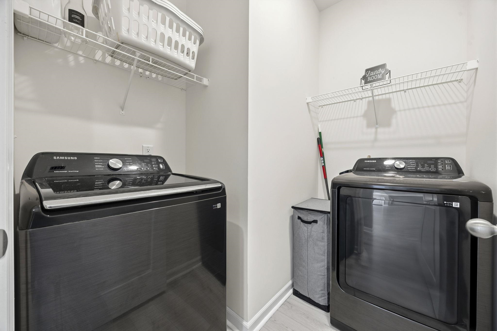 1010 Log Cabin Road Loris, SC 29569 - Photo 23 of 40 Laundry room with independent washer and dryer and light wood-style floors