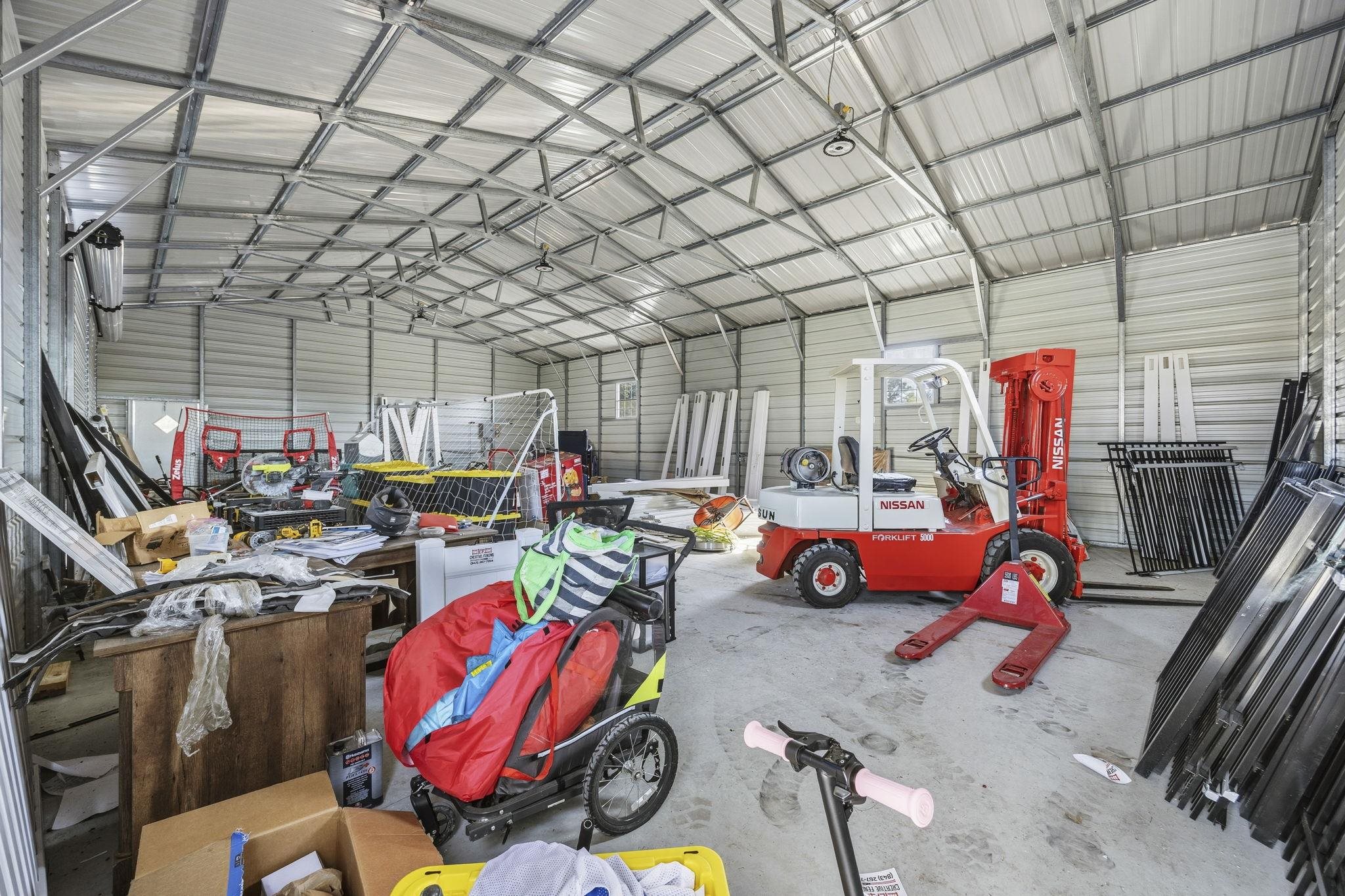 1010 Log Cabin Road Loris, SC 29569 - Photo 29 of 40 Garage featuring metal wall