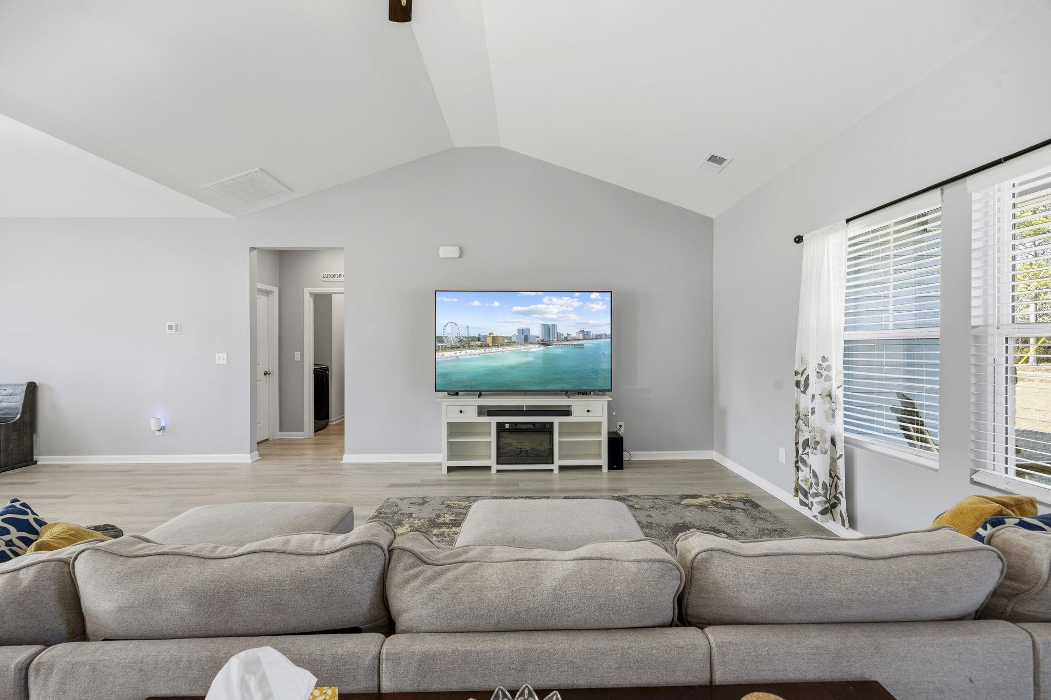 1010 Log Cabin Road Loris, SC 29569 - Photo 6 of 40 Living area with lofted ceiling and wood finished floors