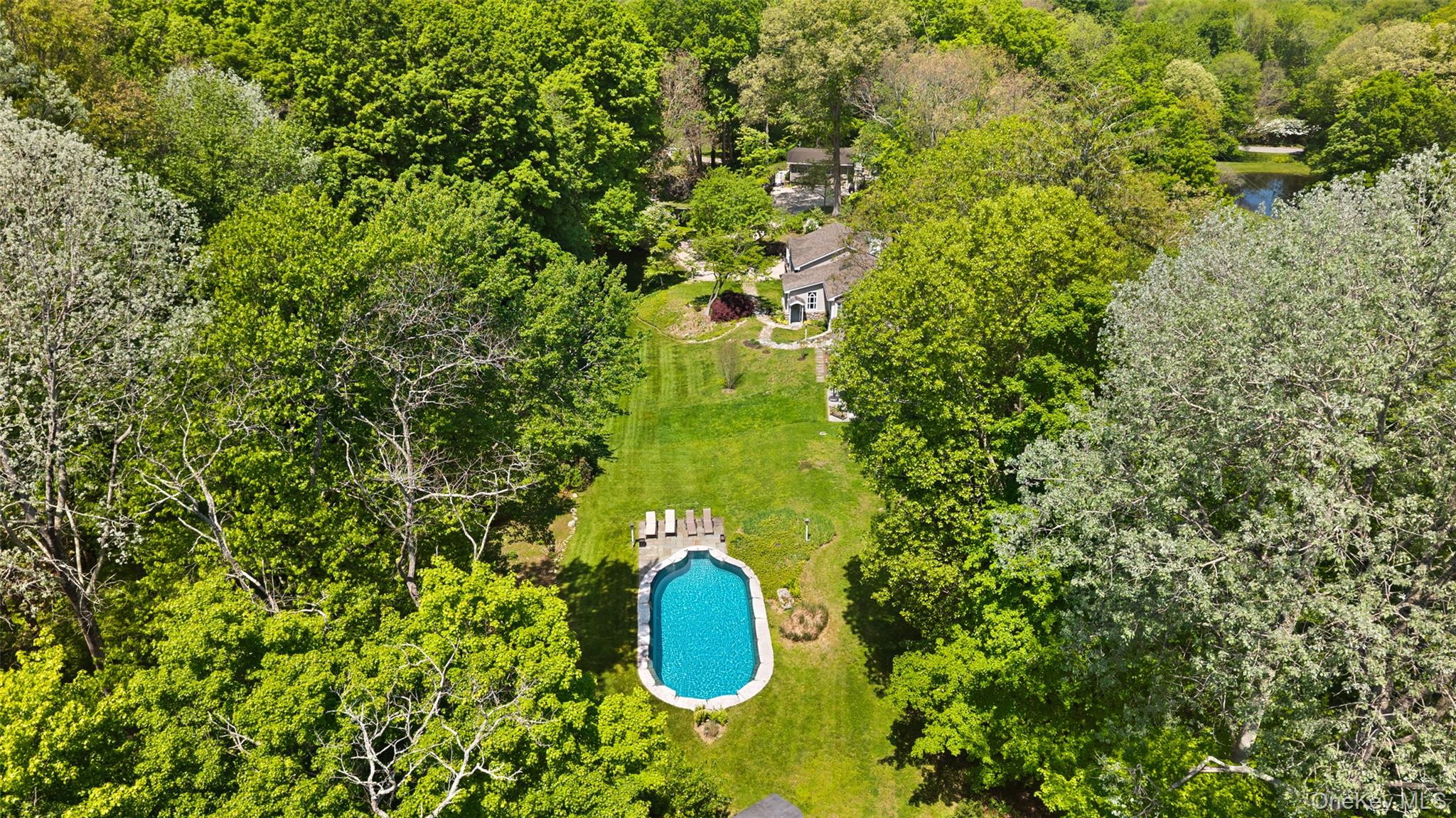 9 Lewis Road Pound Ridge, NY 10576 - Photo 2 of 34 Pool water is Ai enhanced