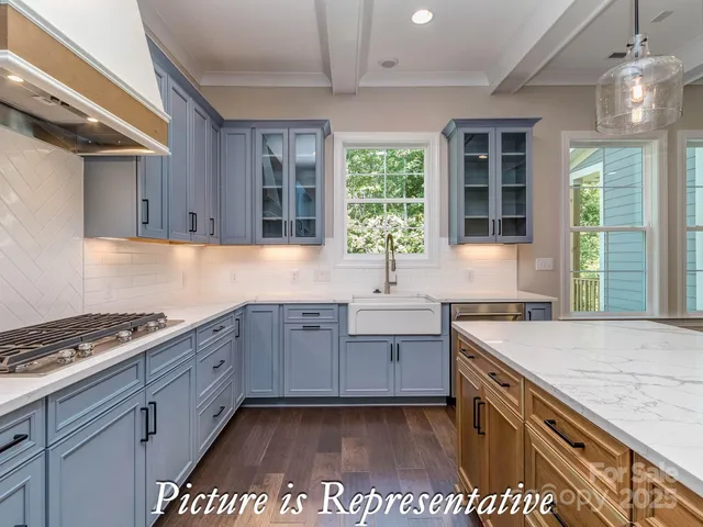 a view of kitchen center island and living room