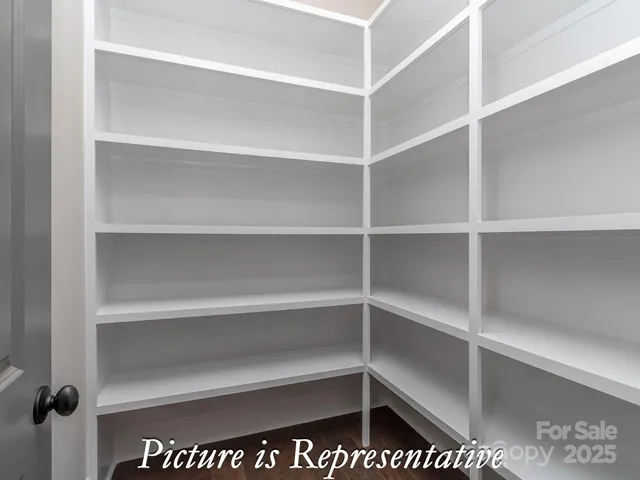 a view of cabinets with sink