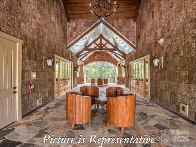 a view of a chairs and table in the patio