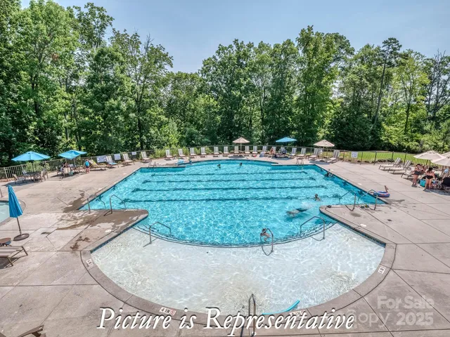 a view of a park with swings and slides