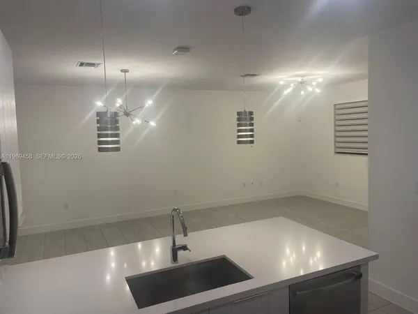 a view of a room with a sink