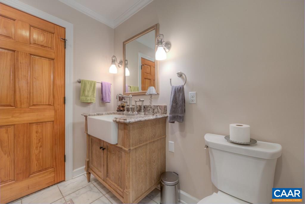 2959 Martin Kings Road Charlottesville, VA 22902 - Photo 16 of 44 a bathroom with a sink toilet and vanity