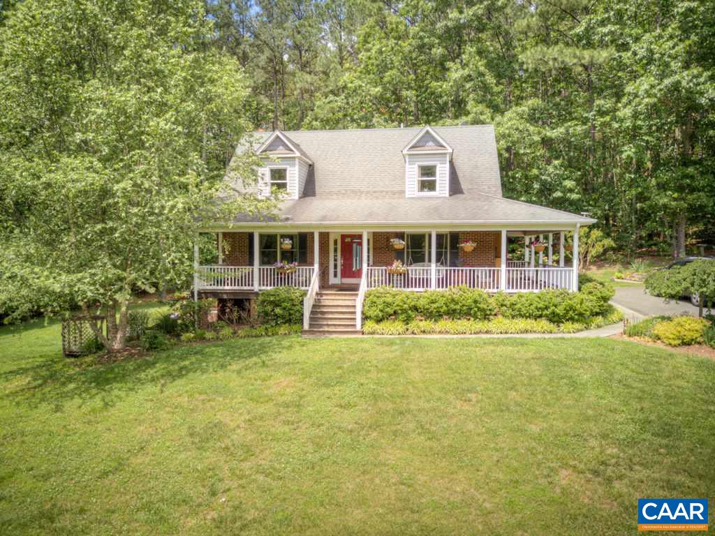 2959 Martin Kings Road Charlottesville, VA 22902 - Photo 2 of 44 a front view of a house with a garden