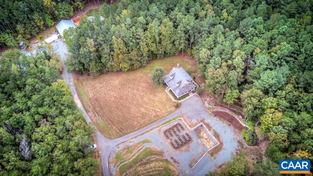 2959 Martin Kings Road Charlottesville, VA 22902 - Photo 3 of 44 an aerial view of a house with a yard and large trees