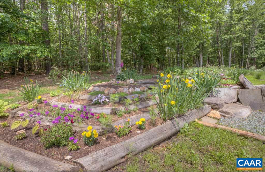 2959 Martin Kings Road Charlottesville, VA 22902 - Photo 34 of 44 a view of a garden with flowers