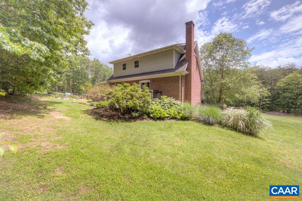 2959 Martin Kings Road Charlottesville, VA 22902 - Photo 37 of 44 a front view of a house with a yard