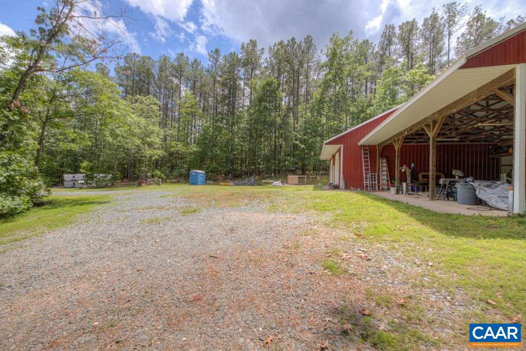 2959 Martin Kings Road Charlottesville, VA 22902 - Photo 41 of 44 a view of a house with backyard and a tree