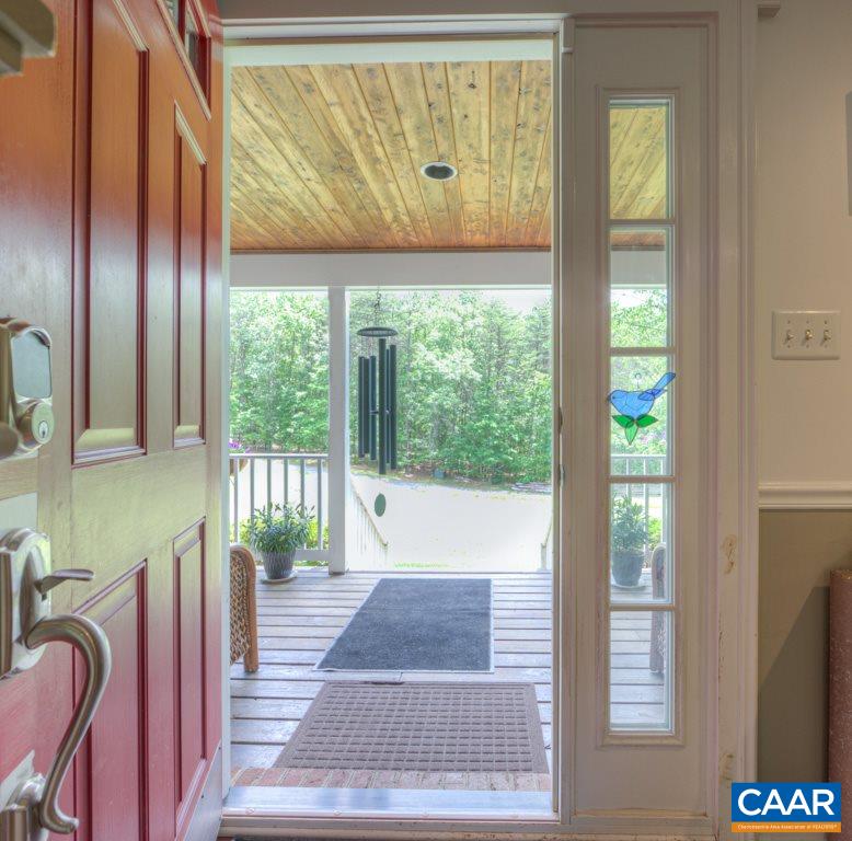 2959 Martin Kings Road Charlottesville, VA 22902 - Photo 6 of 44 a porch with a bench next to a window