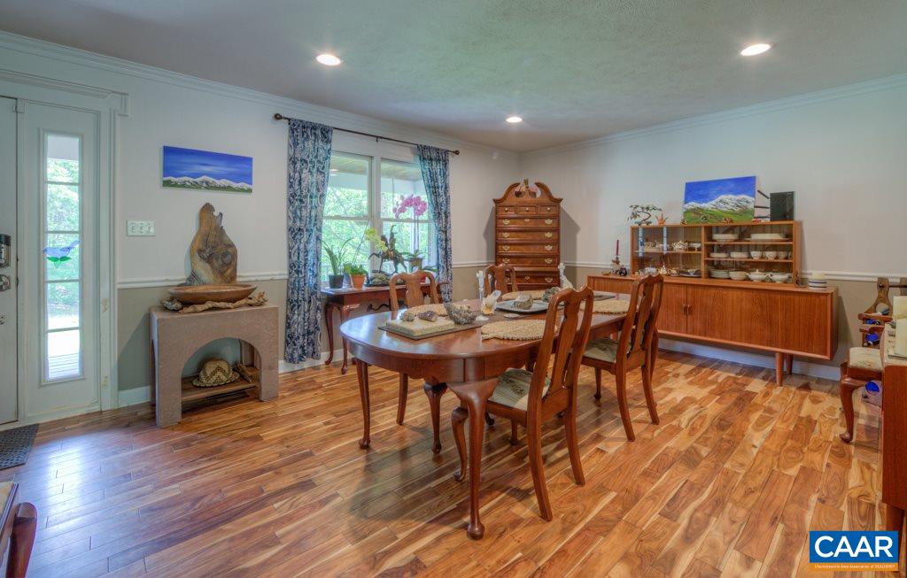 2959 Martin Kings Road Charlottesville, VA 22902 - Photo 7 of 44 a view of a dining room with furniture window and wooden floor