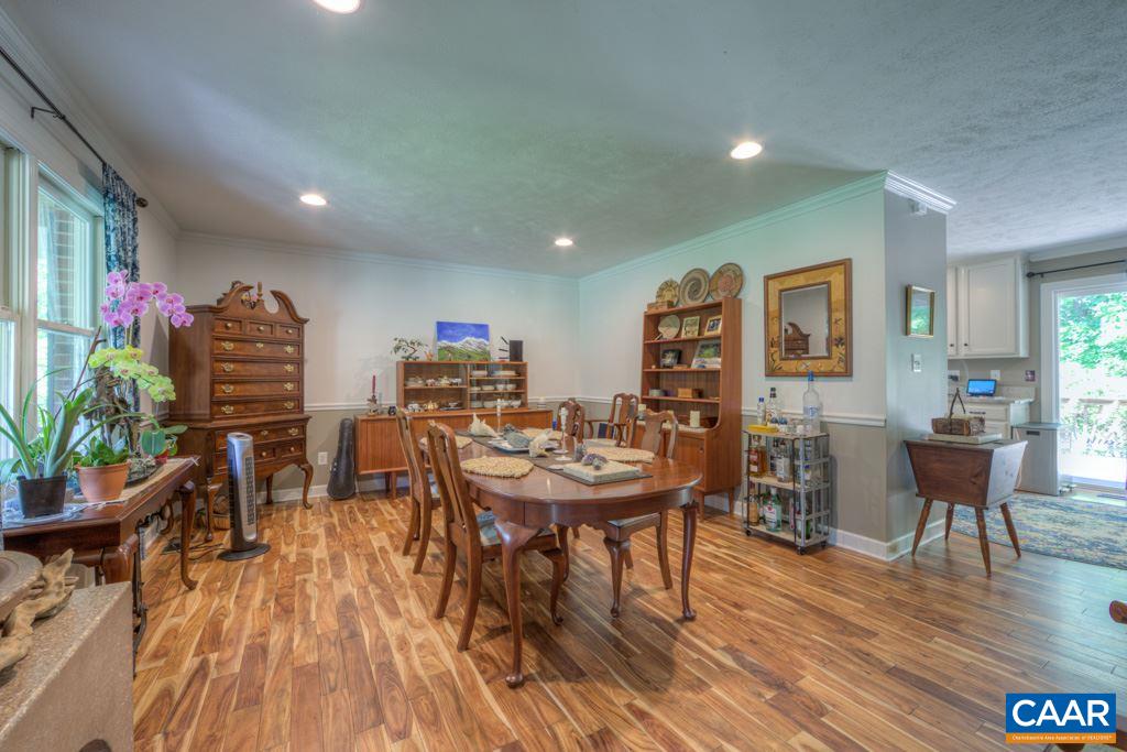 2959 Martin Kings Road Charlottesville, VA 22902 - Photo 8 of 44 a view of a dining room with furniture and wooden floor