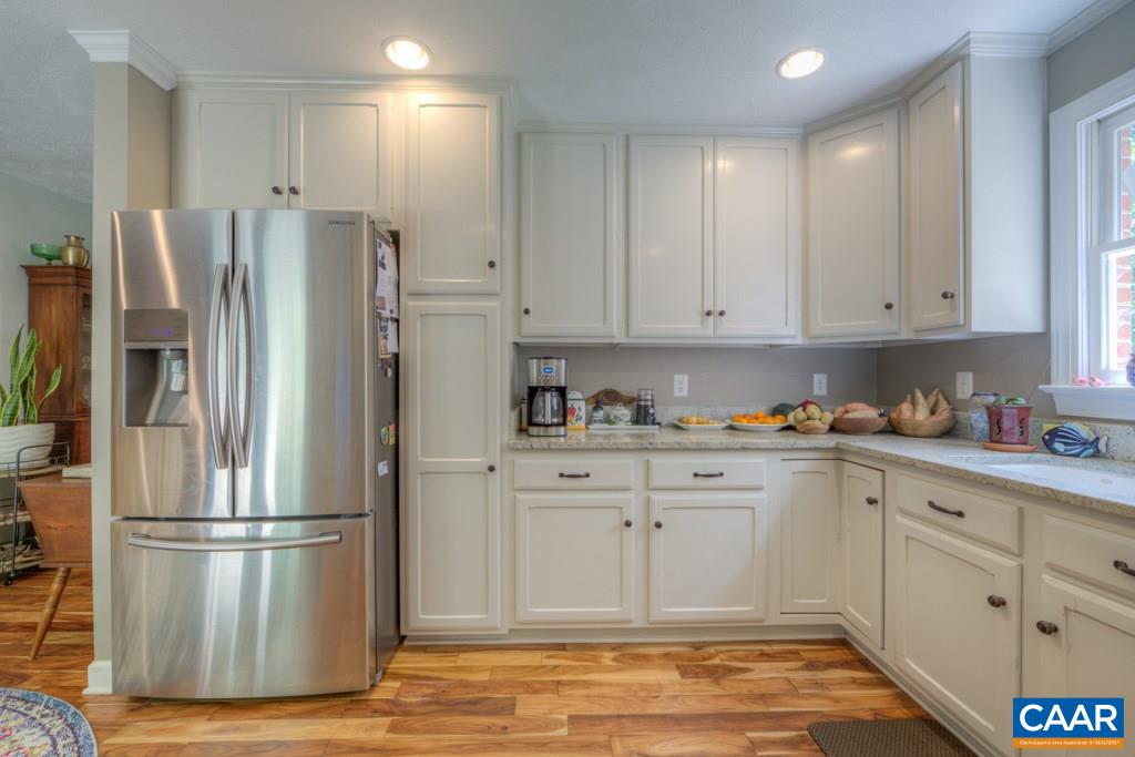 2959 Martin Kings Road Charlottesville, VA 22902 - Photo 9 of 44 a kitchen with stainless steel appliances granite countertop a refrigerator and a stove top oven