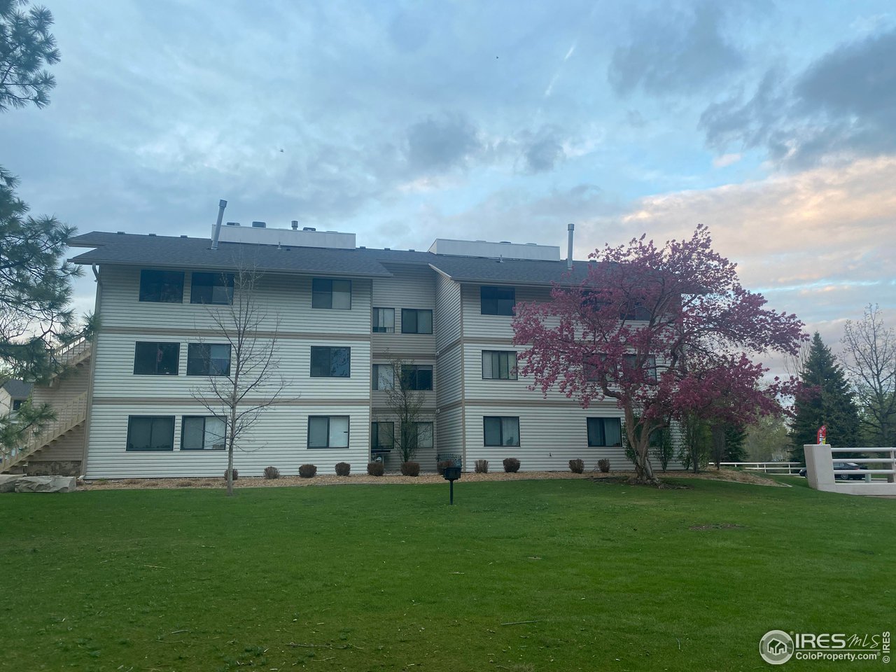1705 Heatheridge Road, Unit H301 Fort Collins, CO 80526 - Photo 11 of 32 a view of house with yard and entertaining space