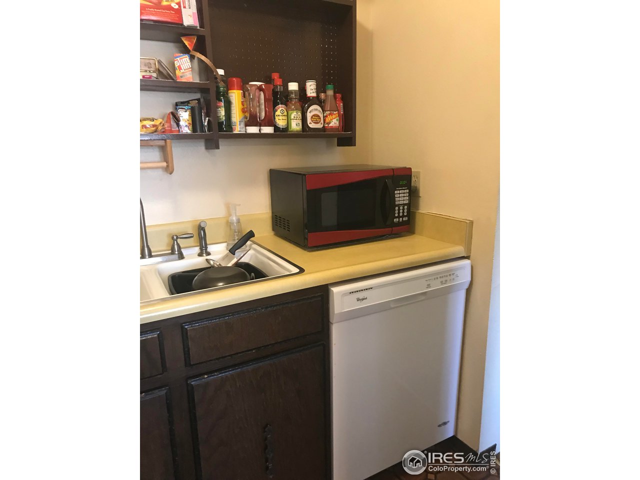 1705 Heatheridge Road, Unit H301 Fort Collins, CO 80526 - Photo 17 of 32 a utility room with dryer and washer