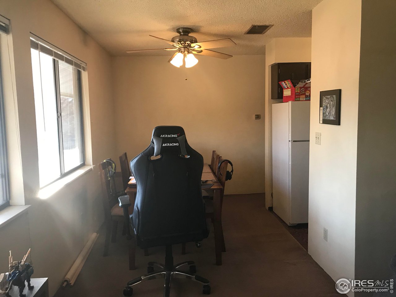 1705 Heatheridge Road, Unit H301 Fort Collins, CO 80526 - Photo 26 of 32 a workspace with furniture and a window