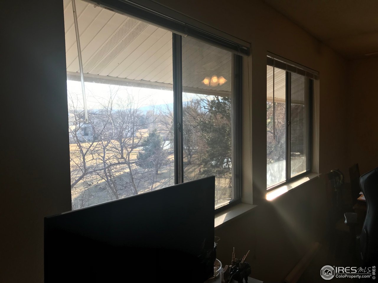 1705 Heatheridge Road, Unit H301 Fort Collins, CO 80526 - Photo 27 of 32 a view of a large window with outside view
