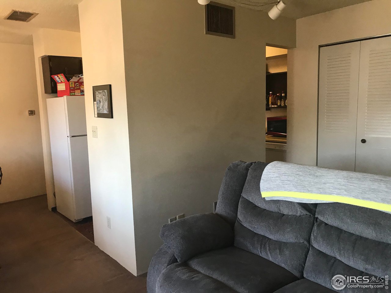 1705 Heatheridge Road, Unit H301 Fort Collins, CO 80526 - Photo 30 of 32 a room with a table and chairs