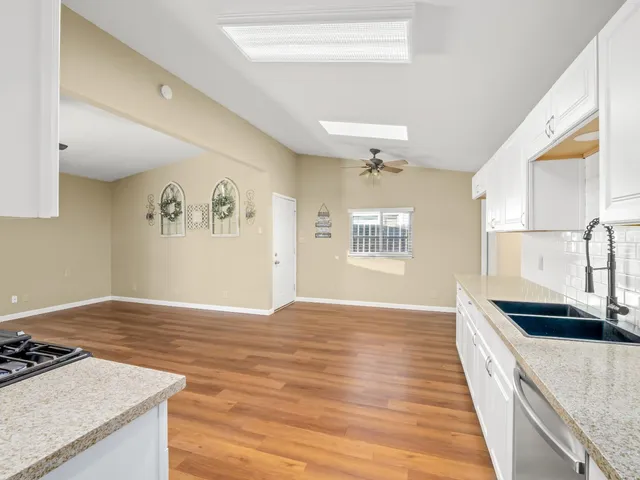 a view of a kitchen from the hallway