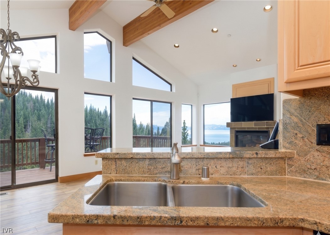 400 Fairview Boulevard, Unit 162 Incline Village, NV 89451 - Photo 13 of 50 a kitchen with granite countertop a sink and a window