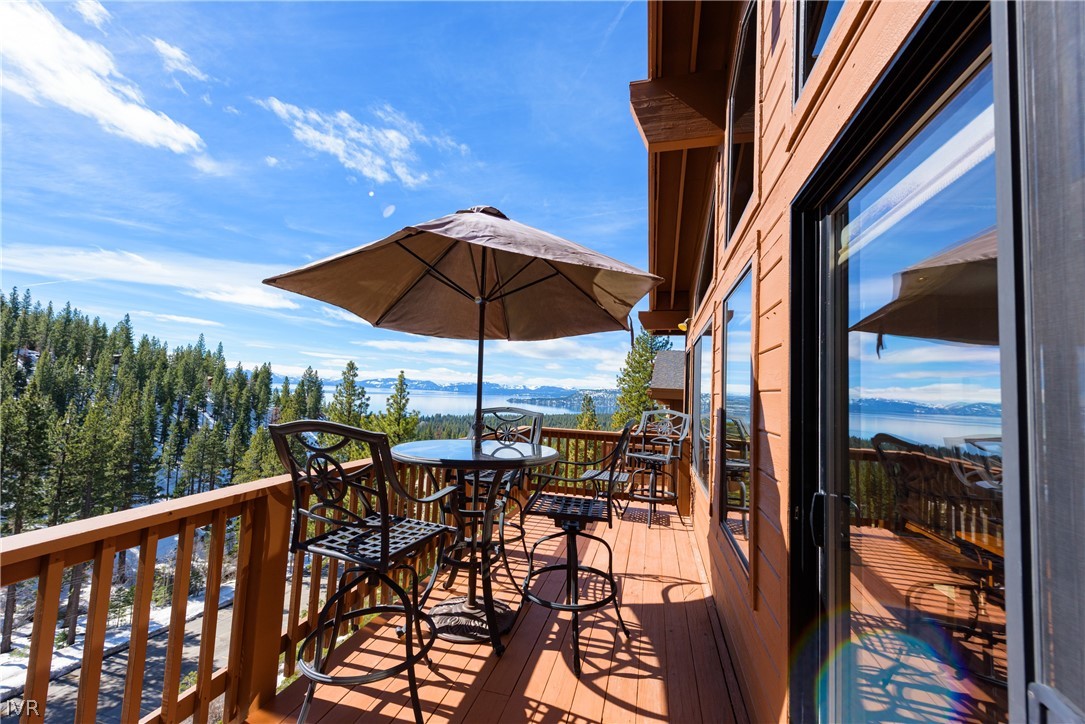 400 Fairview Boulevard, Unit 162 Incline Village, NV 89451 - Photo 16 of 50 a view of balcony with chairs and umbrella