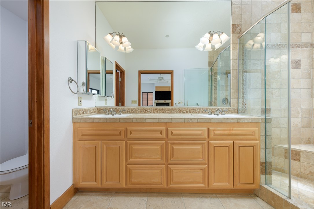 400 Fairview Boulevard, Unit 162 Incline Village, NV 89451 - Photo 23 of 50 a bathroom with a sink vanity and a mirror