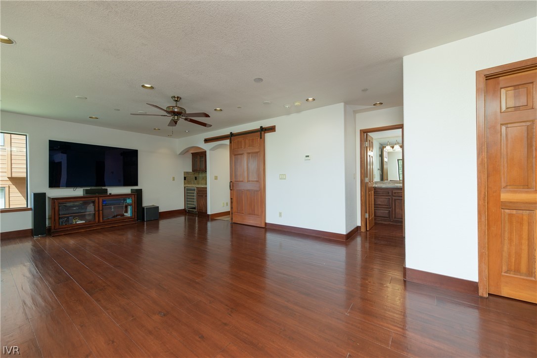 400 Fairview Boulevard, Unit 162 Incline Village, NV 89451 - Photo 33 of 50 a view of a livingroom with wooden floor and a flat screen tv